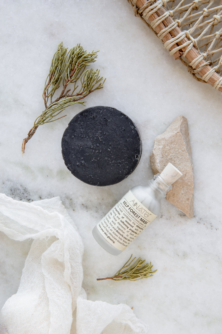 Zero Waste Voyager Kit includes 1 Arborescent serum (large, 30 ml) + 1 Black Cedar Soap + 1 Kelp Forest Face Mask, + 1 TREE balm +  2 Tree I.D. postcards (green and tan) Anato Forest to Face Skincare